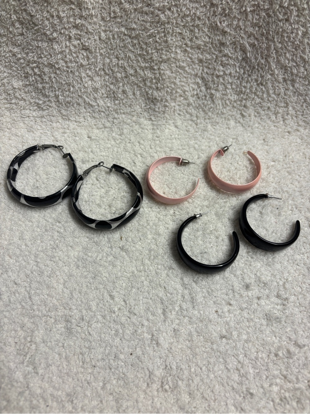 Three pairs of lightweight hoop earrings